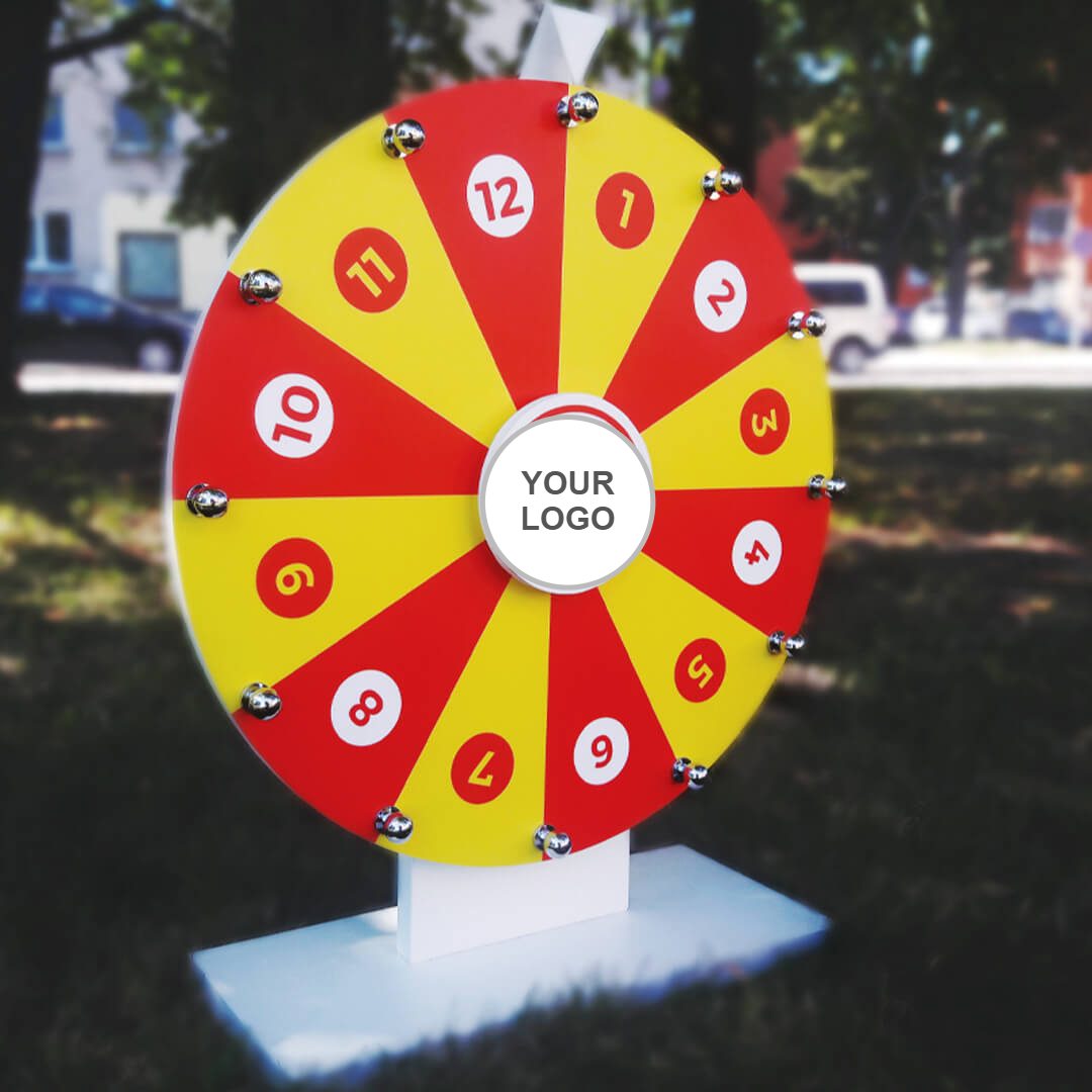 Red and yellow numbered prize wheel of fortune with space for a logo in the centre
